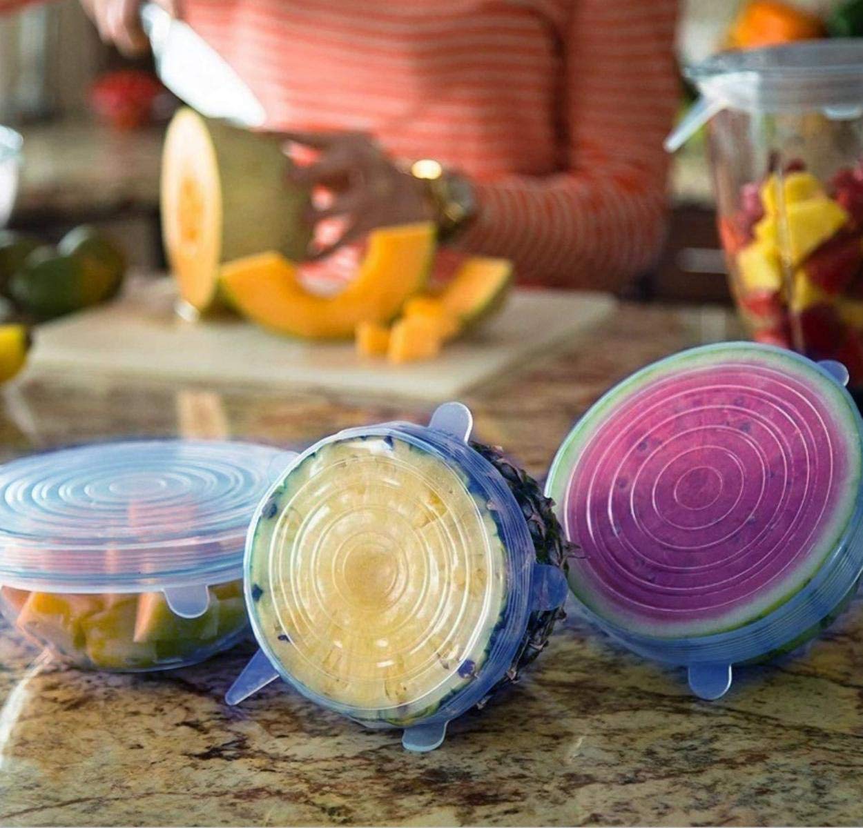 Set of six Wukusy silicone stretch lids, reusable microwave-safe flexible covers for bowls and containers in a home and kitchen setting.