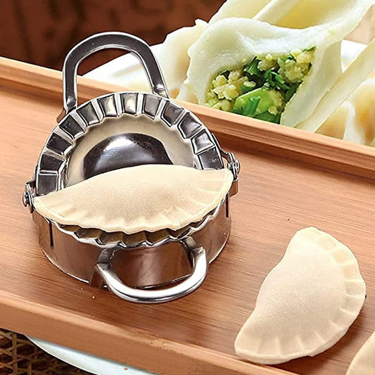 Wukusy stainless steel dumpling maker and dough cutter, pie mold tool for home and kitchen use, with textured handles.