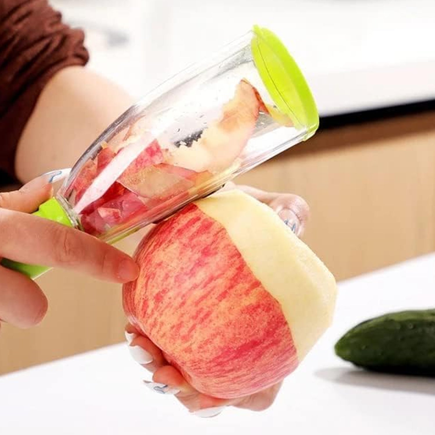 Wukusy 2230 Smart Multifunctional Vegetable and Fruit Peeler for kitchen use, with ergonomic handle and stainless steel blades.