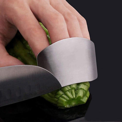 Wukusy stainless steel finger guard cutting protector for kitchen safety, preventing cuts during food preparation.