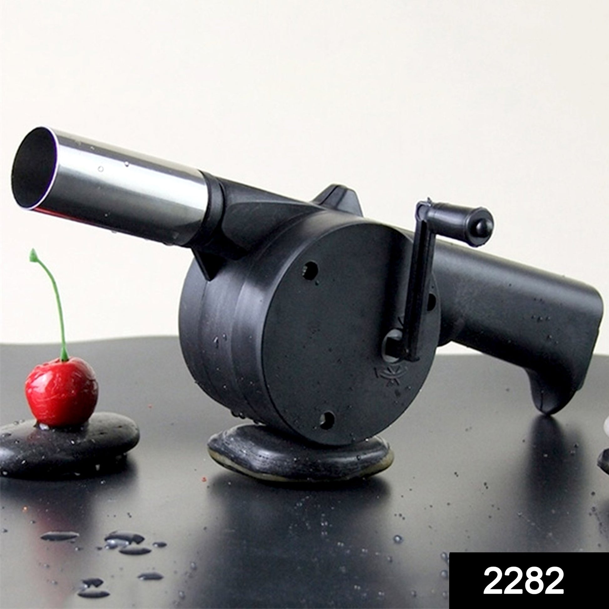 Wukusy portable hand crank air blower fan for charcoal grill and BBQ, compact kitchen tool for easy fire-starting.