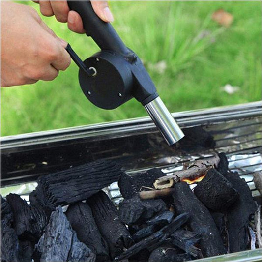 Wukusy portable hand crank air blower fan for charcoal grill and BBQ, compact tool for easy fire ignition and airflow control.