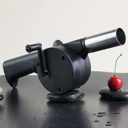 Wukusy portable hand crank air blower fan for charcoal grill and BBQ, compact and manual for easy outdoor cooking airflow.