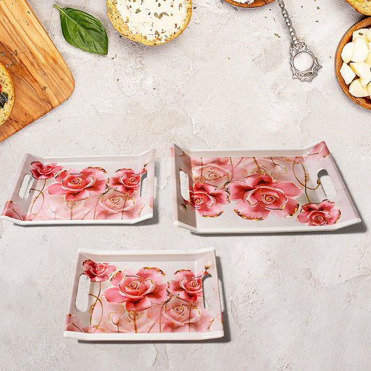 Set of three Wukusy plastic rectangular serving trays with colorful flower print, ideal for home and kitchen use.