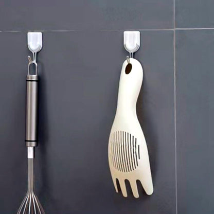 Wukusy rice sieve washer and strainer spoon for rinsing and draining rice in a home kitchen setting.