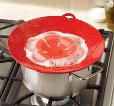 Wukusy multifunctional silicone lid cover on a pot, flexible, heat-resistant kitchen accessory for pots and pans.
