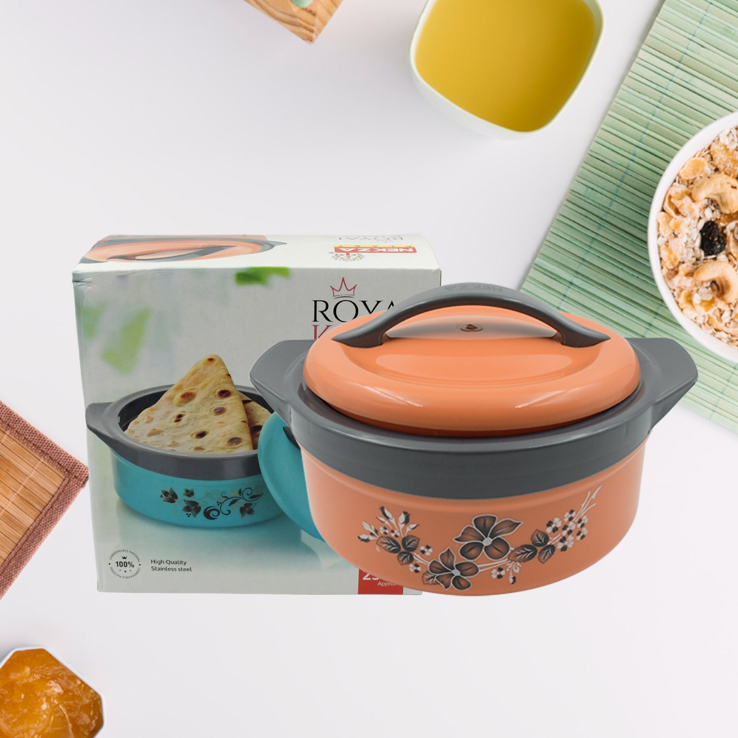 Wukusy insulated steel casserole box with floral print, 2500ml capacity, used for serving hot food and chapatis in the kitchen.