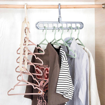 Wukusy 9-hole plastic hanger hook for indoor wardrobe, clothes organization, storage, balcony, and windowsill use.