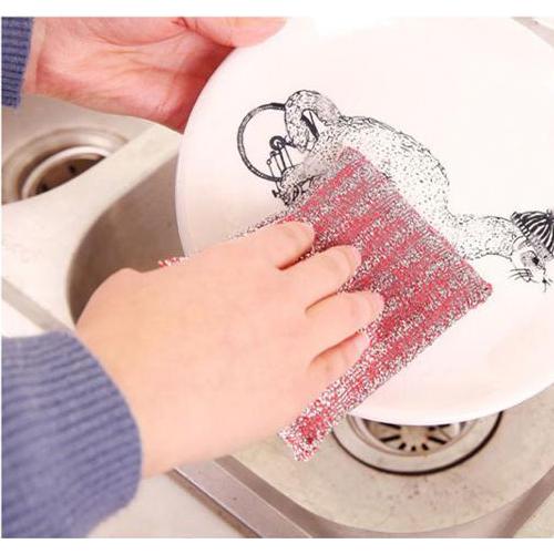 Wukusy scratch-proof kitchen utensil scrubber pads, pack of 12, durable and gentle for cleaning pots and pans in the home kitchen.