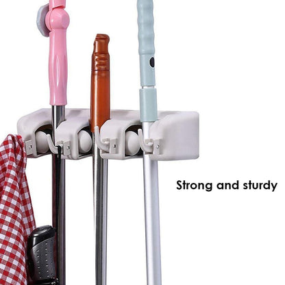 Wukusy 240 3-layer mop and broom holder for home and kitchen, wall-mounted storage for cleaning tools.