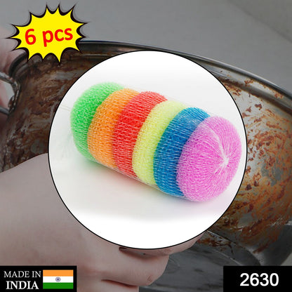 Six Wukusy round plastic nylon scrubbers for kitchen cleaning, ideal for scrubbing dishes and surfaces in home and kitchen use.