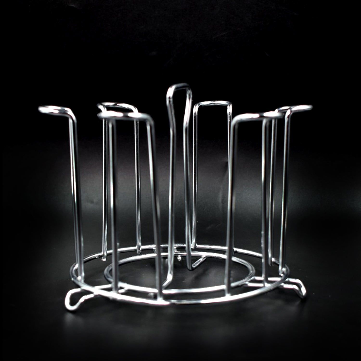 Wukusy stainless steel round glass stand for holding sensitive glasses, suitable for home and kitchen use in various settings.