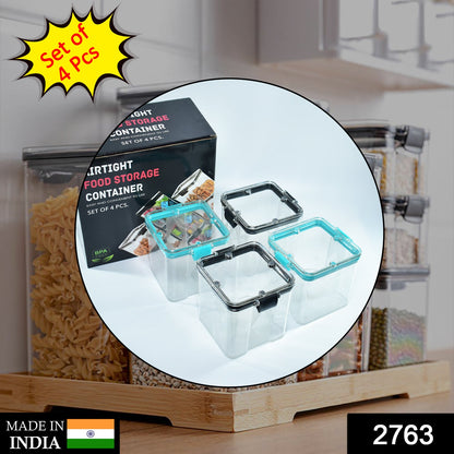Wukusy 4-piece square food storage containers, 700ml capacity, used for storing various food items in the home kitchen.