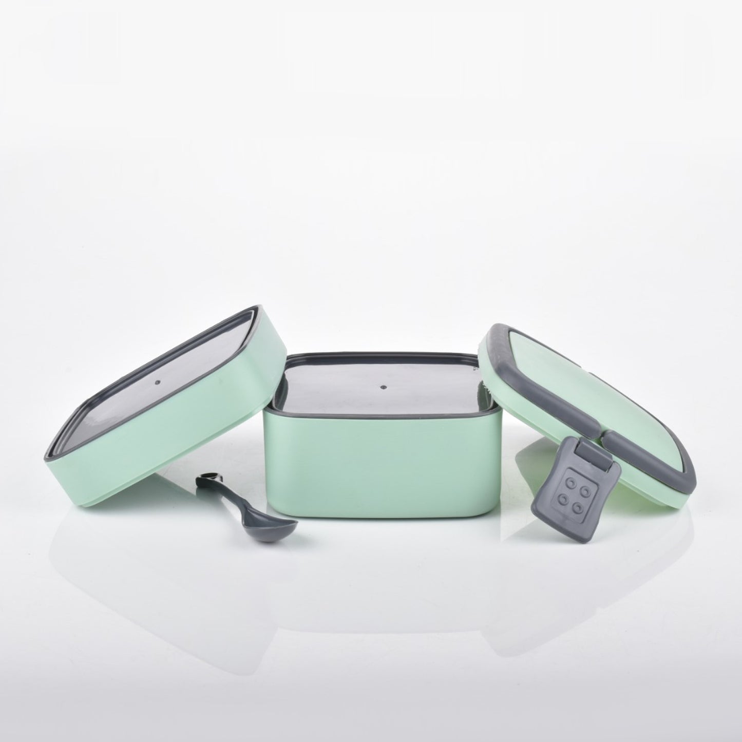 Green Wukusy double-layer portable lunch box with handle and spoon, stackable design for easy carrying and meal storage.