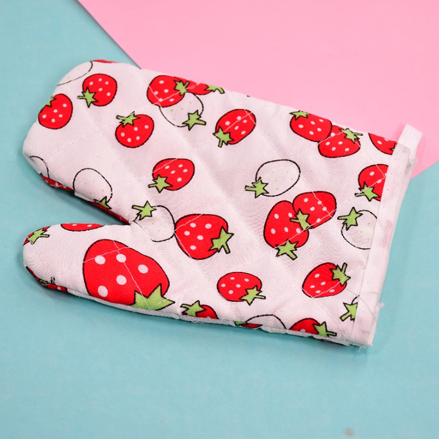 Multicoloured Wukusy designer oven mitt and pot holder set for kitchen protection and style.