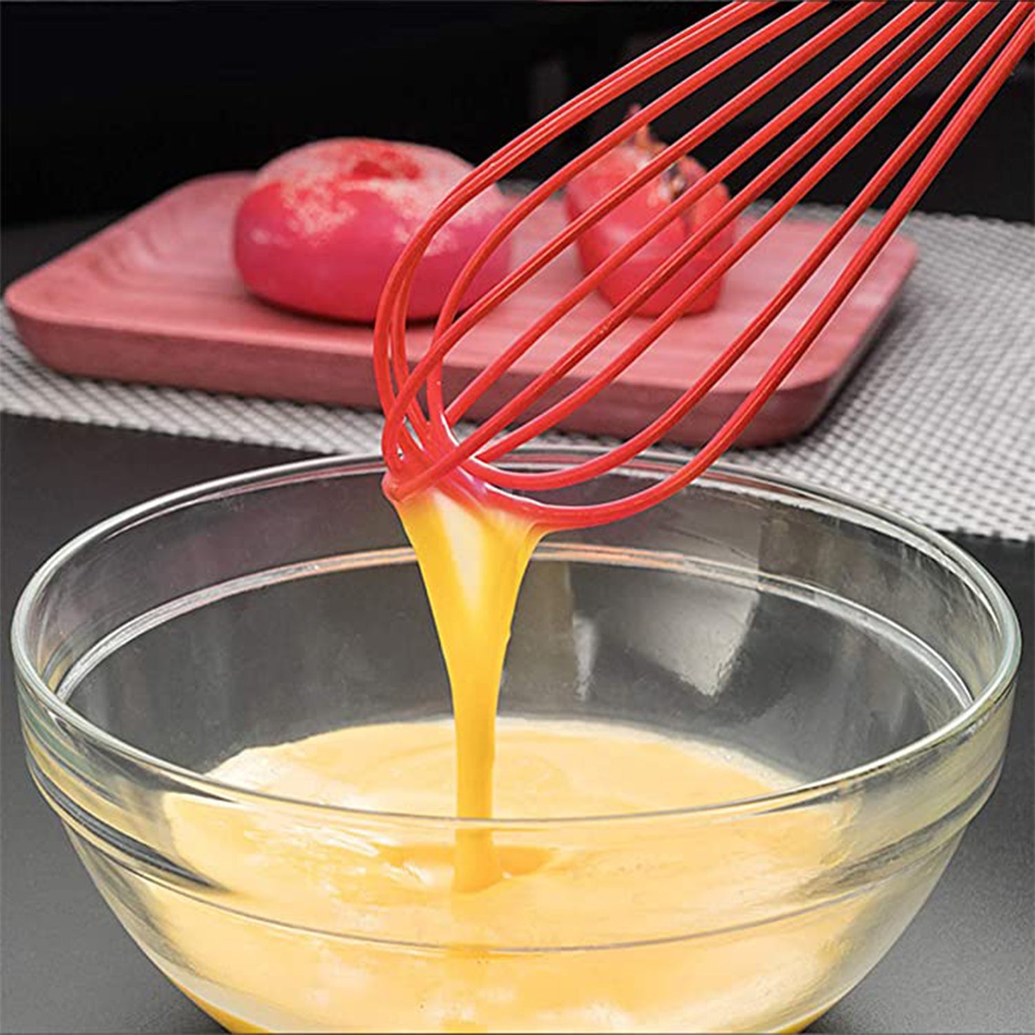 Wukusy manual whisk mixer with silicone wires for whipping cream, mixing flour, and eggs in home baking and kitchen tasks.
