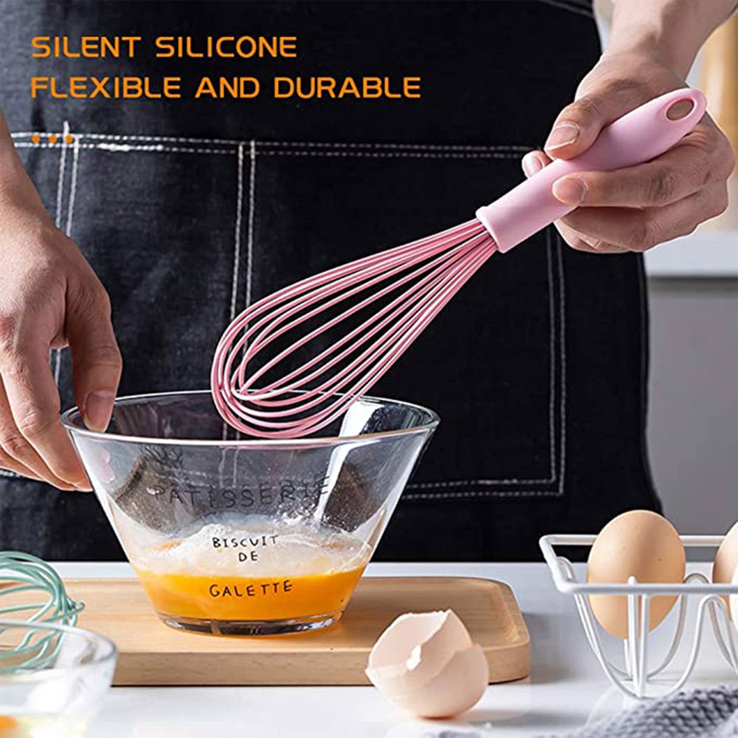 Wukusy manual whisk mixer with silicone head, ideal for whipping cream, mixing flour, and eggs in kitchen baking tasks.