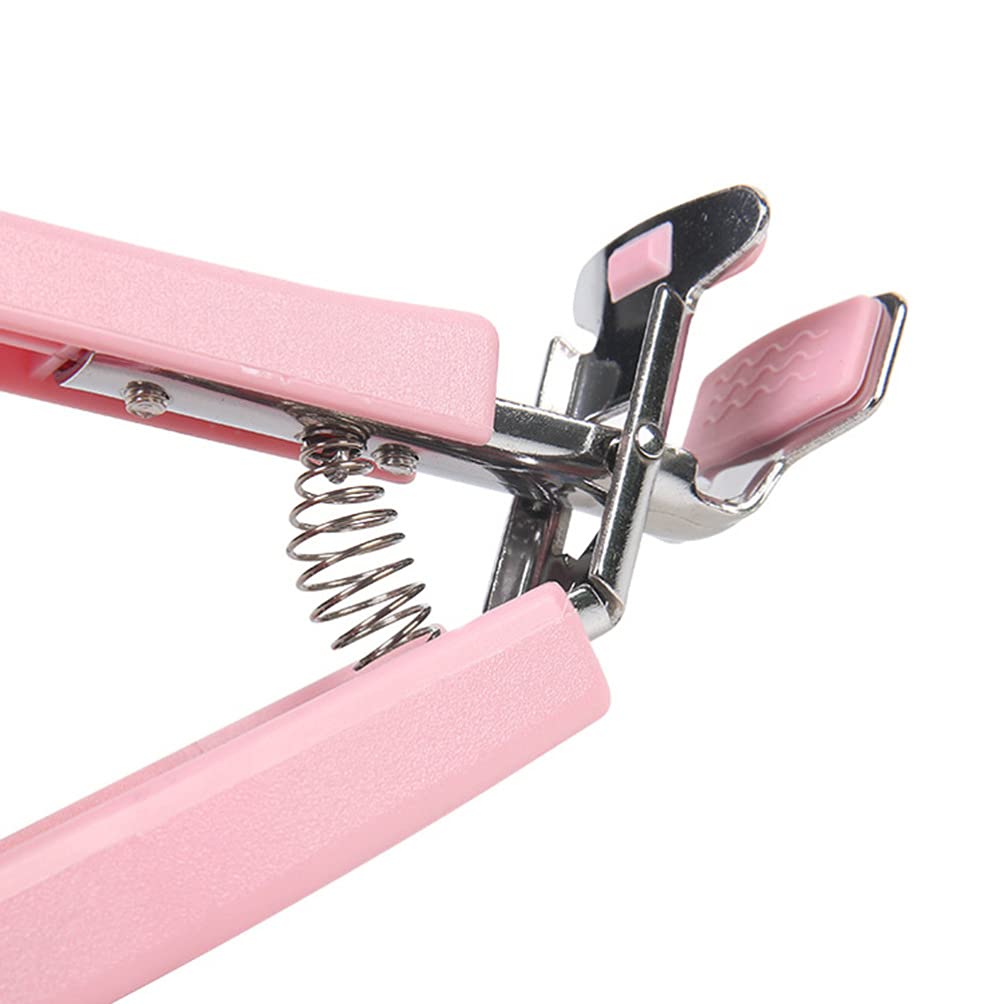 Stainless steel Wukusy hot dish plate clip and tongs for gripping bowls, pans, and dishes in home kitchen use.