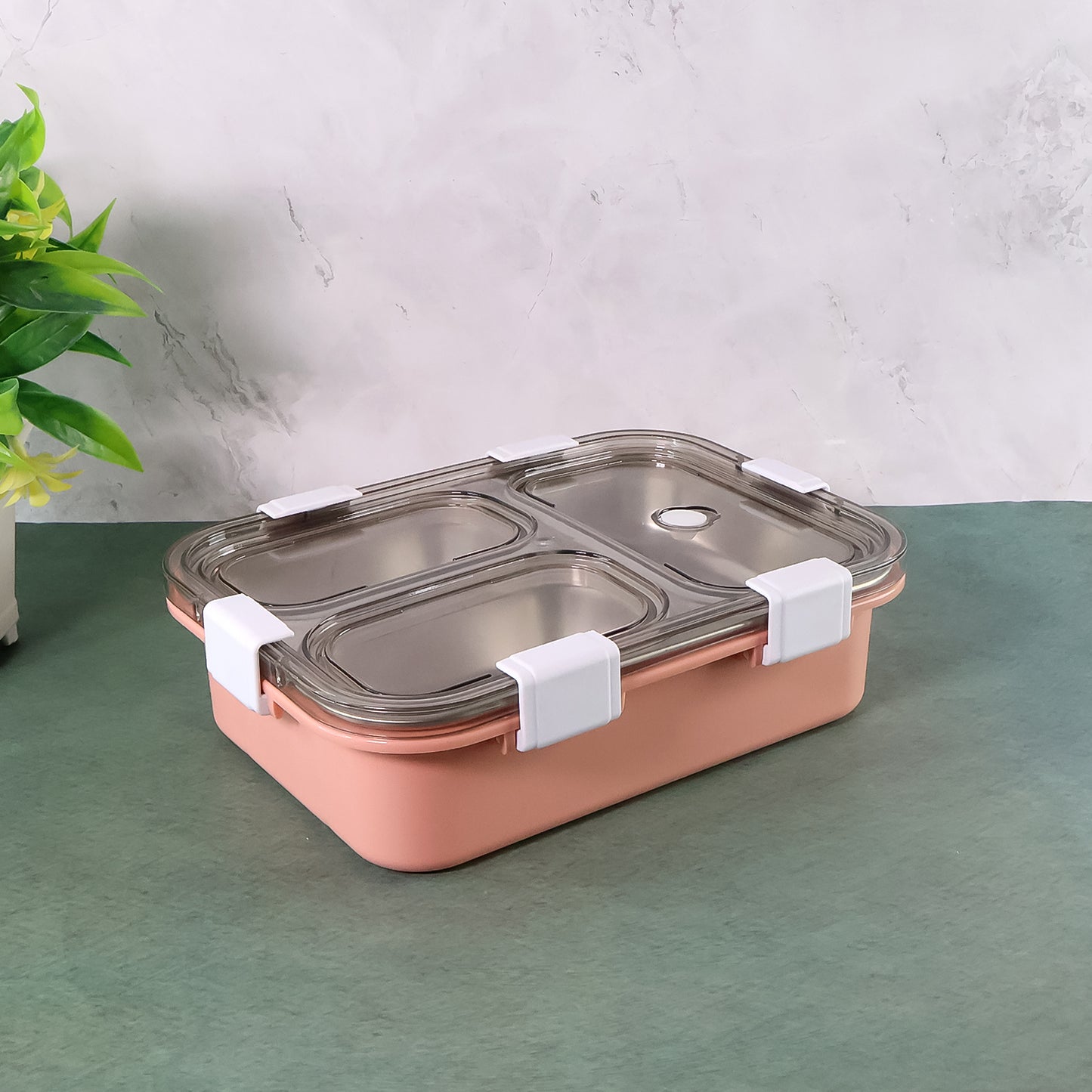 Wukusy 3-compartment lunch box for kids with separate sections for sandwiches, snacks, and fruits, durable plastic container.