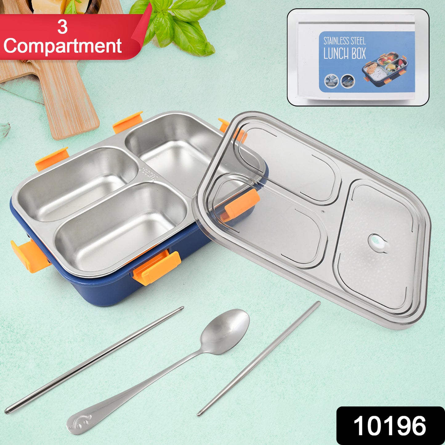 Wukusy 3-compartment transparent stainless steel lunch box with spoon and chopsticks on a kitchen countertop.