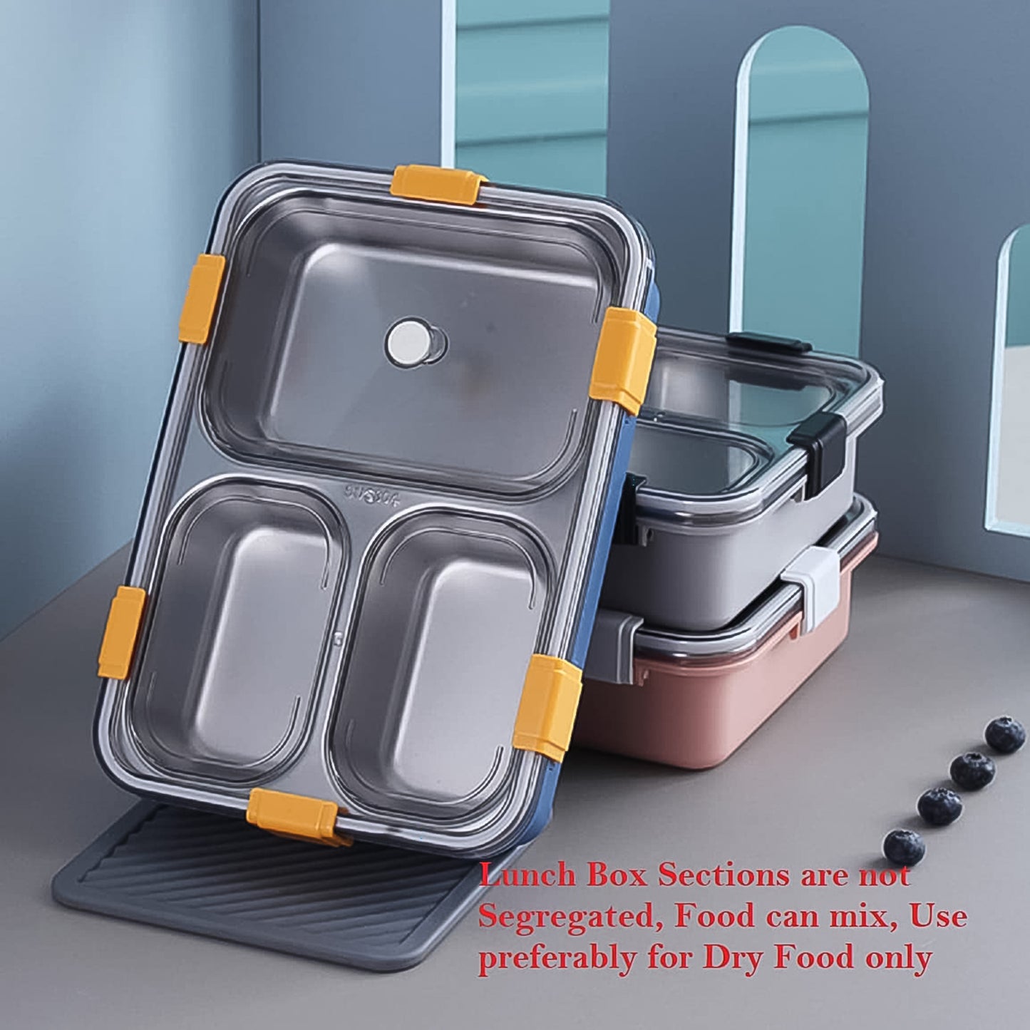 Wukusy 3-compartment transparent stainless steel lunch box with spoon and chopsticks for convenient meal storage and transport.