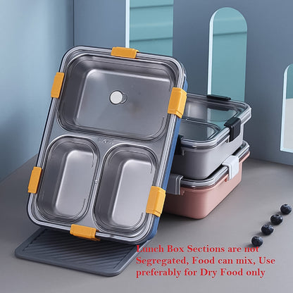 Wukusy 3-compartment transparent stainless steel lunch box with spoon and chopsticks for convenient meal storage and transport.