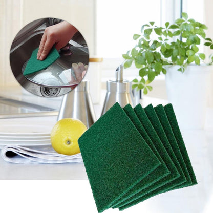 Aqua green Wukusy scrub sponge cleaning pad for kitchen and home use, with a textured surface for effective scrubbing.