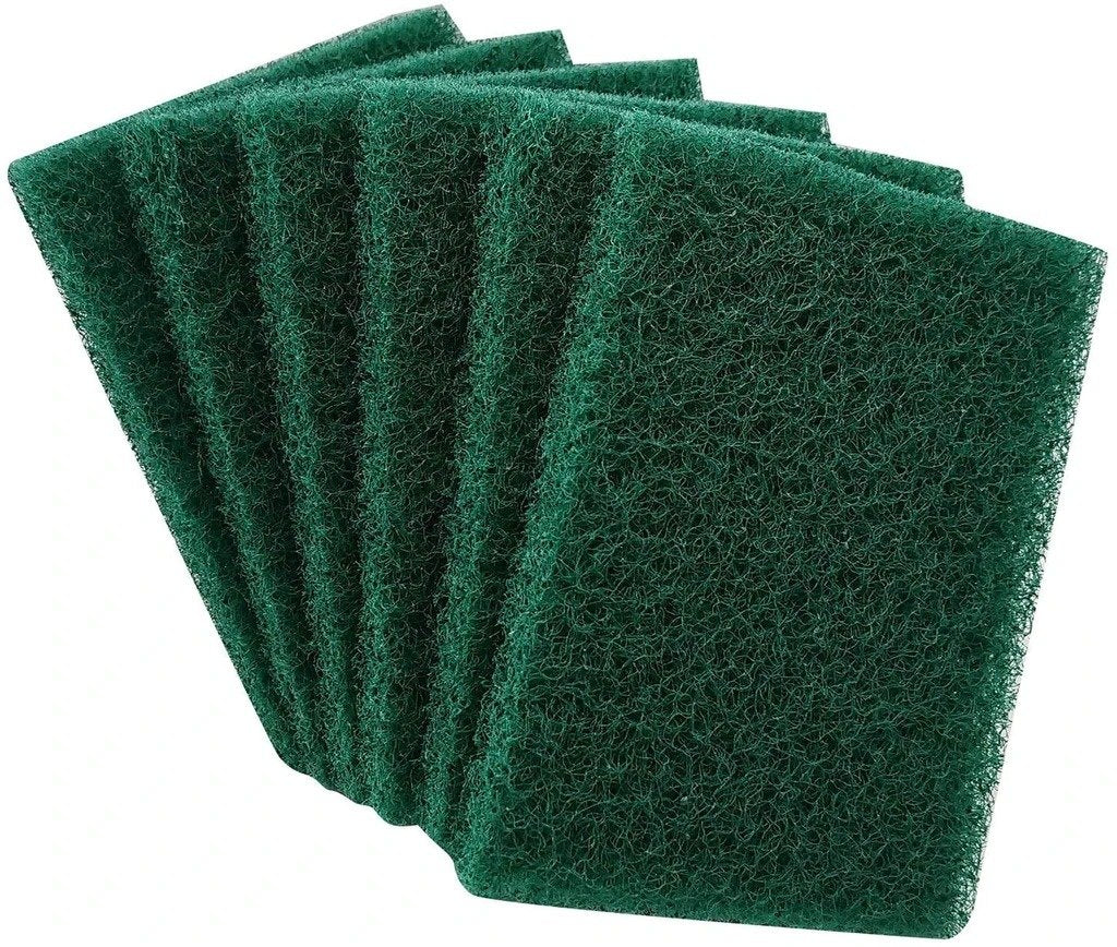 Aqua green Wukusy scrub sponge cleaning pad for kitchen and home use, with a textured surface for scrubbing dishes and surfaces.