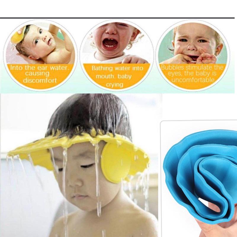 Wukusy adjustable safe soft baby shower cap in pastel blue, with elastic band and gentle waterproof material for baby bath time.
