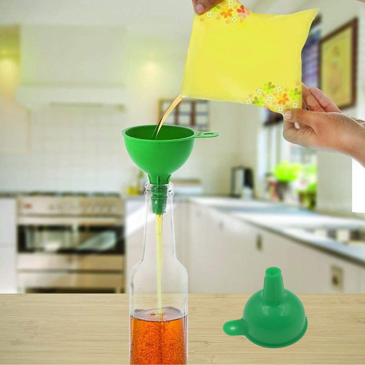 Green Wukusy silicone funnel for pouring oil, sauce, water, juice, and small food grains in home and kitchen use.