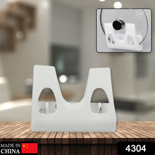 Wall-mounted Wukusy pot lid rack organizer with multiple slots for lids, pans, and plates in a modern kitchen setting.