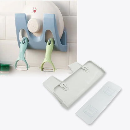 Wall-mounted Wukusy pot lid rack for kitchen, holds lids, pans, and dishes, punch-free wall organizer for kitchen storage.