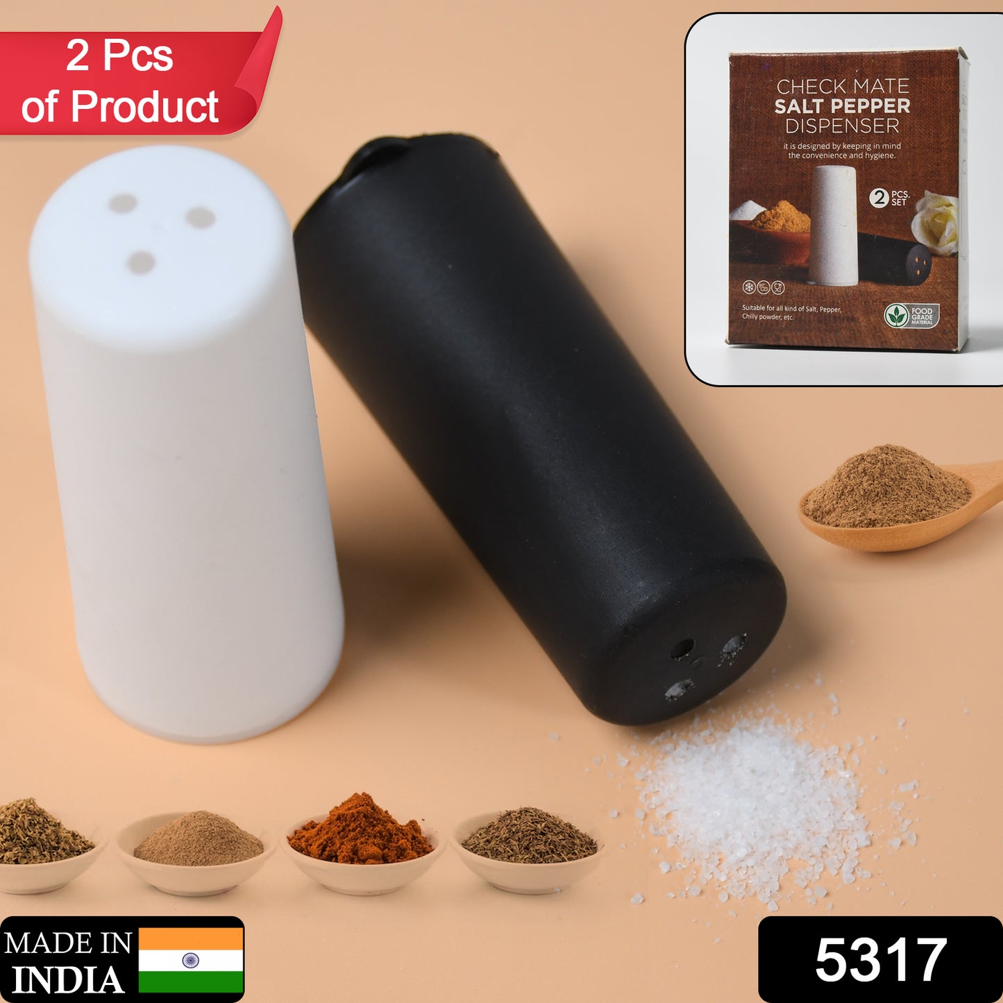 Wukusy salt and pepper dispenser on dining table, modern spice storage for home or hotel use, sleek design for kitchen and table.