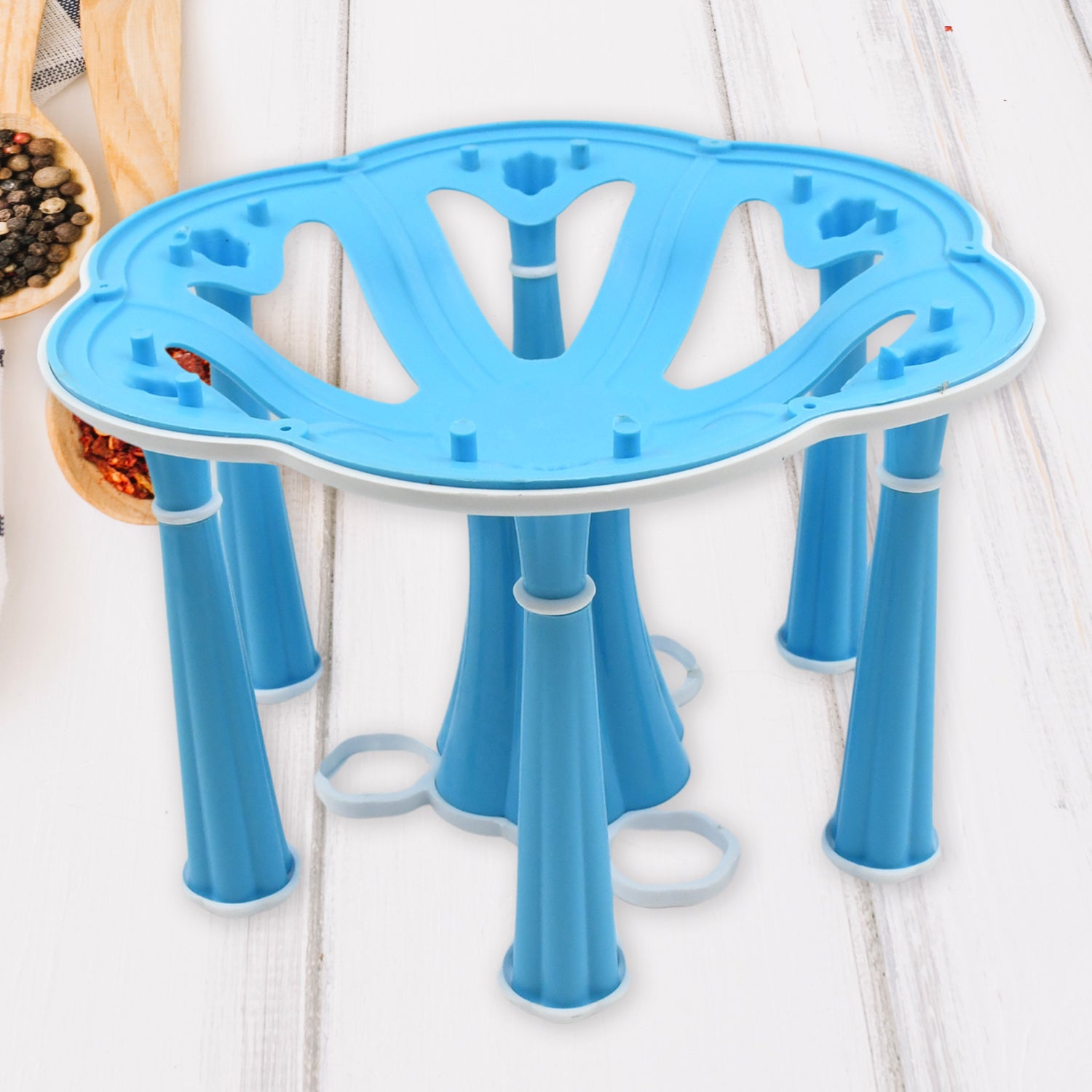 Wukusy Miracle Plastic Glass Stand for kitchen and dining, holds 6 glasses with 3 compartments for pepper and salt.