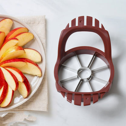 Wukusy stainless steel apple slicer and fruit divider with core remover, kitchen tool for cutting and separating apples.