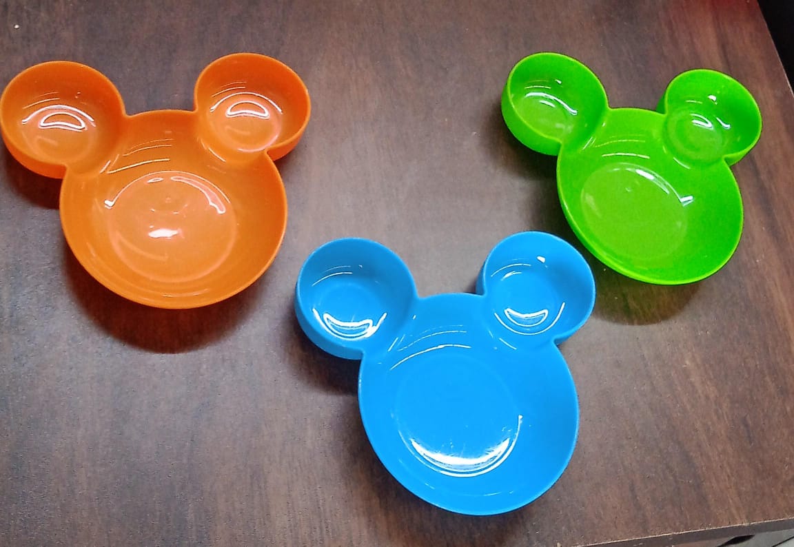 Unbreakable Mickey Mouse-shaped BPA-free kids plate and bowl set with cartoon design for children’s food and fruit.