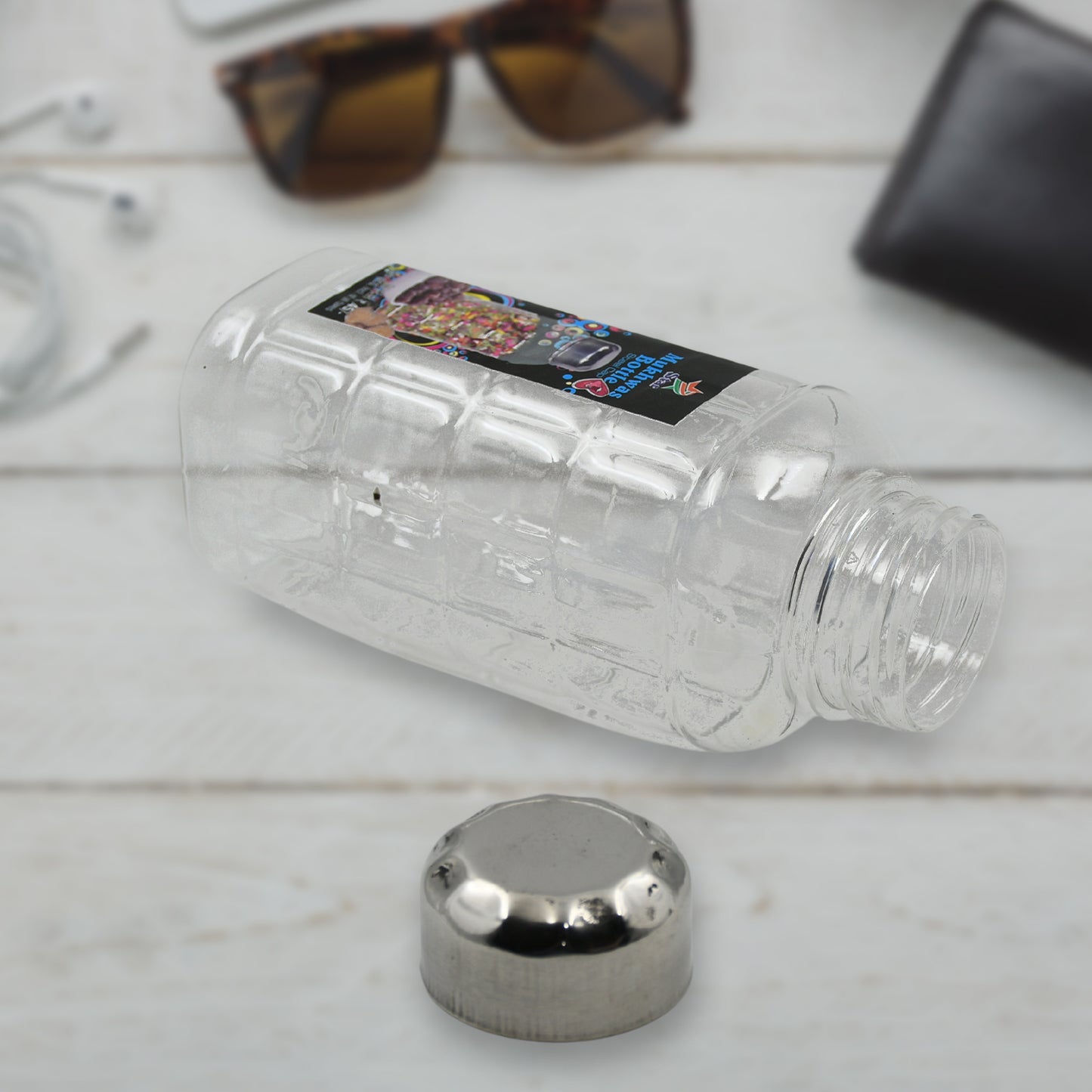 Wukusy transparent plastic Mukhwas bottle with steel cap, air-tight, BPA-free kitchen storage for dry fruits and mouth fresheners.