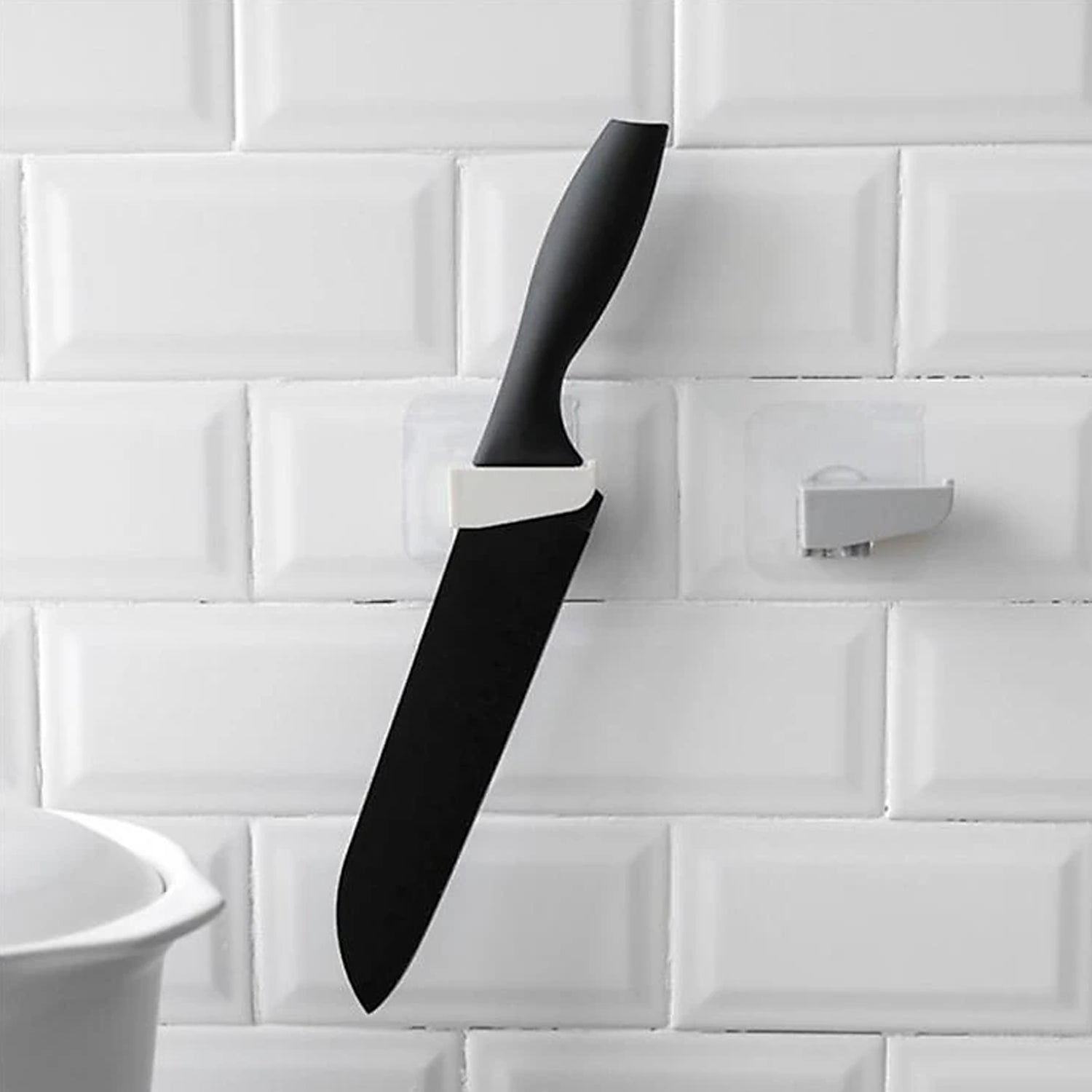 Wukusy punch-free wall-mounted knife holder with multiple slots for kitchen knives and utensils, stainless steel design.