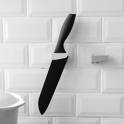Wukusy punch-free wall-mounted knife holder with multiple slots for kitchen knives and utensils, stainless steel design.