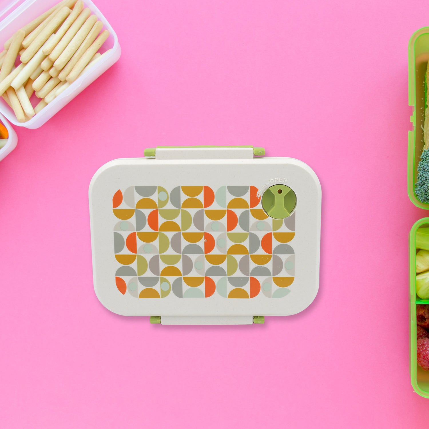 Wukusy 5855 lunch box with three compartments and leak-proof design, includes a spoon for school or office use.