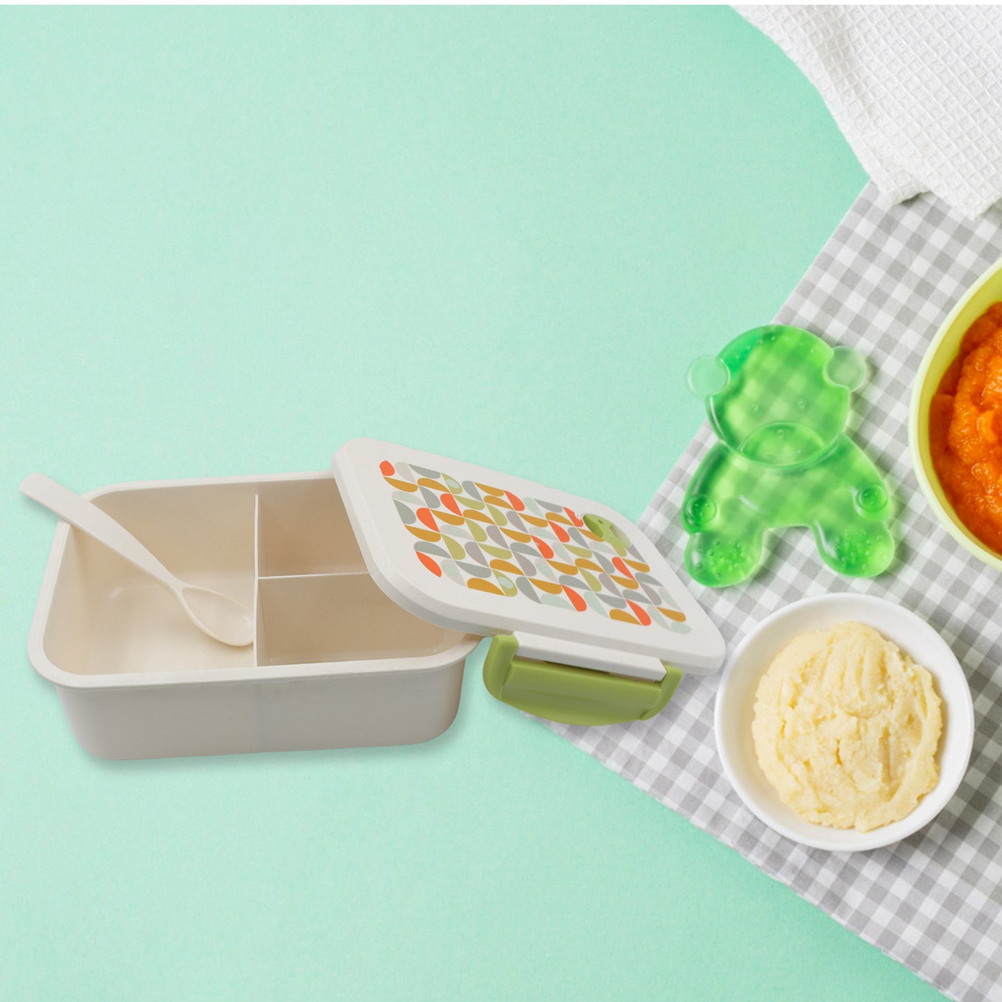 Wukusy 5855 lunch box with three compartments, leak-proof design, includes a spoon, suitable for school and office use.