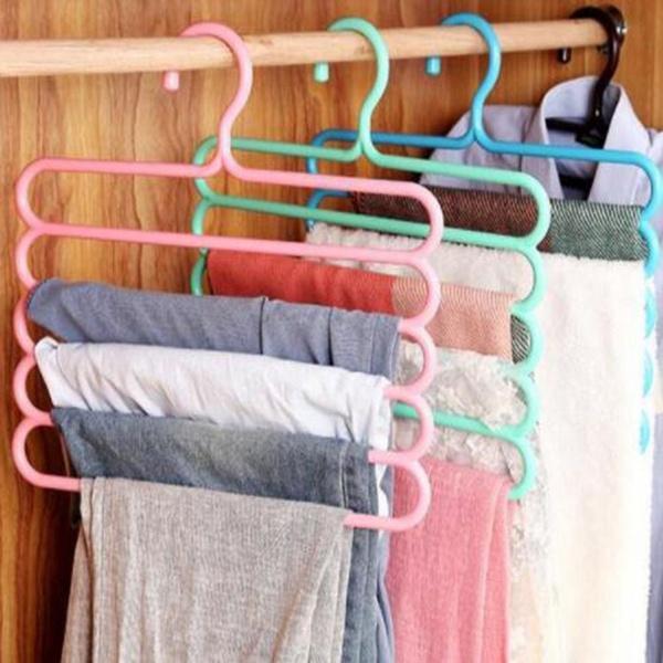 Wukusy 5-in-1 multipurpose plastic hanger with five layers, assorted colors, ideal for organizing clothes in home and kitchen spaces.