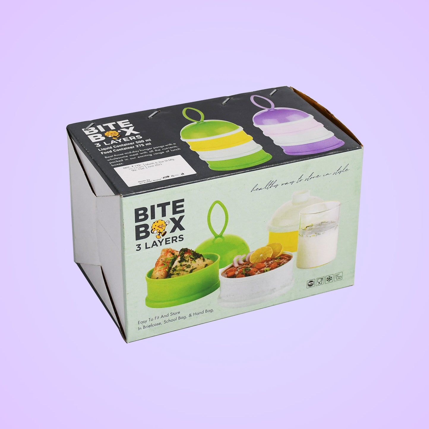Green Wukusy 3-layer lunch box with liquid food container, featuring a unique design for storing and transporting meals.