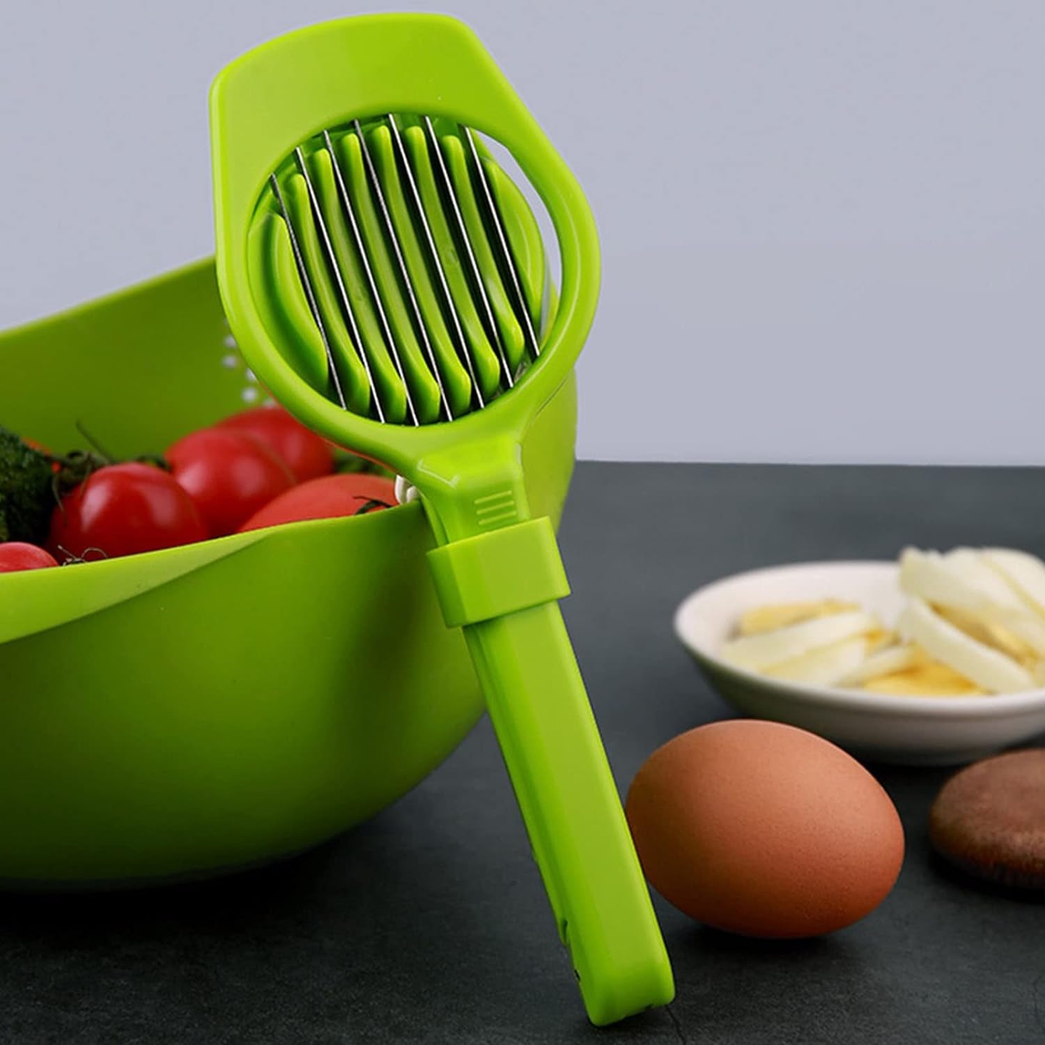 Wukusy multipurpose stainless steel slicer with seven blades for eggs, strawberries, tomatoes, kiwis, and fruit slicing.