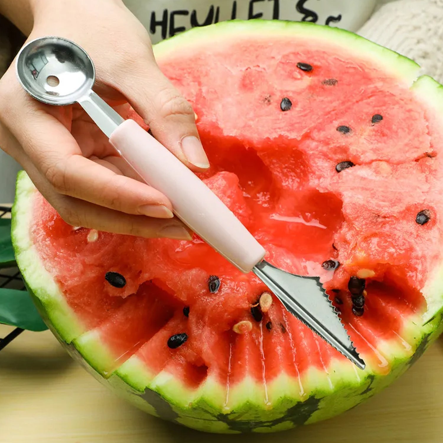 Wukusy multifunctional stainless steel carving knife with fruit and vegetable pattern, includes peeler, corer, scoop, and garnishing tools.