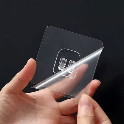 Transparent self-adhesive wall hook from Wukusy, waterproof and drill-free, ideal for bathroom and kitchen organization.