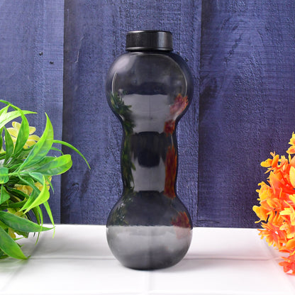 Wukusy 550ml dumbbell-shaped water bottle for gym and home use, featuring a sleek design and durable plastic body.