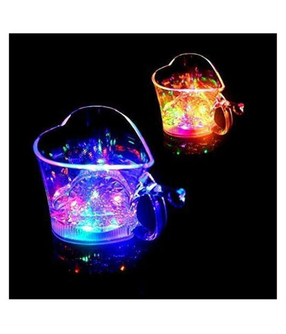 Heart-shaped blinking LED glass cup from Wukusy, illuminated with colorful lights, perfect for home and kitchen decor.