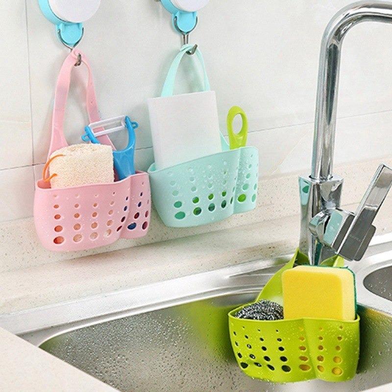 Wukusy adjustable plastic kitchen and bathroom sink caddy with water drainage and built-in faucet for organization.