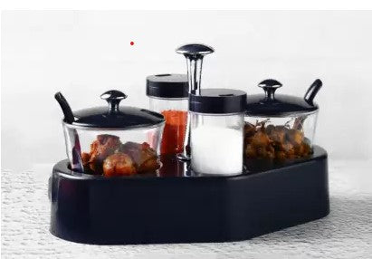 Wukusy Ganesh Rendy condiment set with transparent plastic jar for easy access to spices in the kitchen.